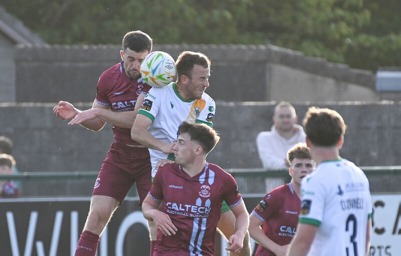 Cobh Ramblers' Brendan Frahill and Kerry's Ryan Kelliher battle in the air. Picture: David Keane. Cobh Ramblers' Brendan Frahill and Kerry's Ryan Kelliher battle in the air. Picture: David Keane.