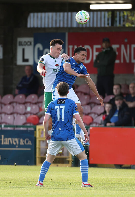  Charlie Lyons, Cork City, battling Oran Brogan, Finn Harps. Picture: Jim Coughlan.