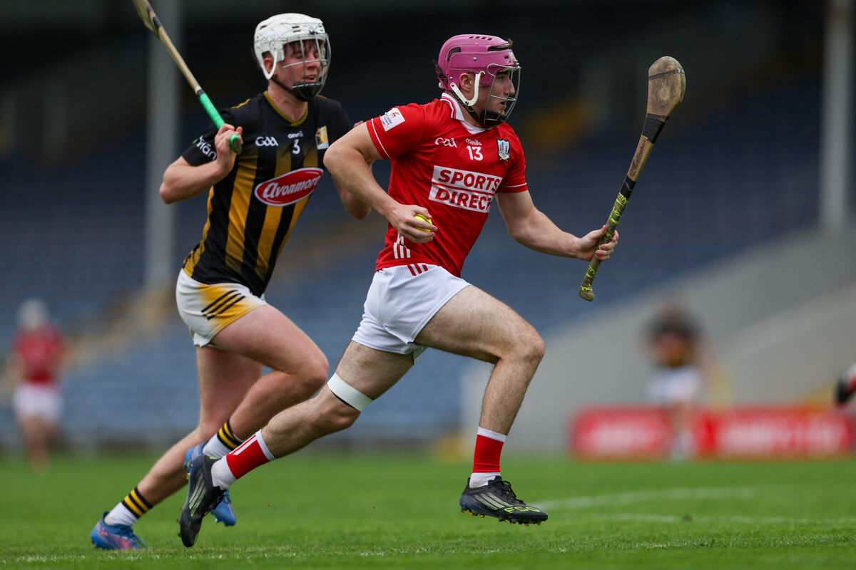 Callum Coffey powers past Kilkenny's Tadhg Purcell. Picture: Diarmuid Brennan/Sportsfocus.