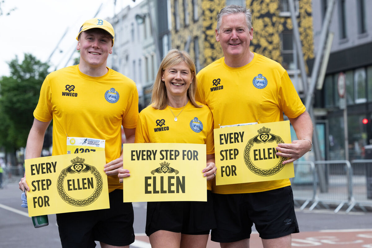 Parents and brother of Ellen Cassidy – Charlie, Violet and Tom at the start line of the Cork City Marathon this morning. Picture: Darragh Kane
