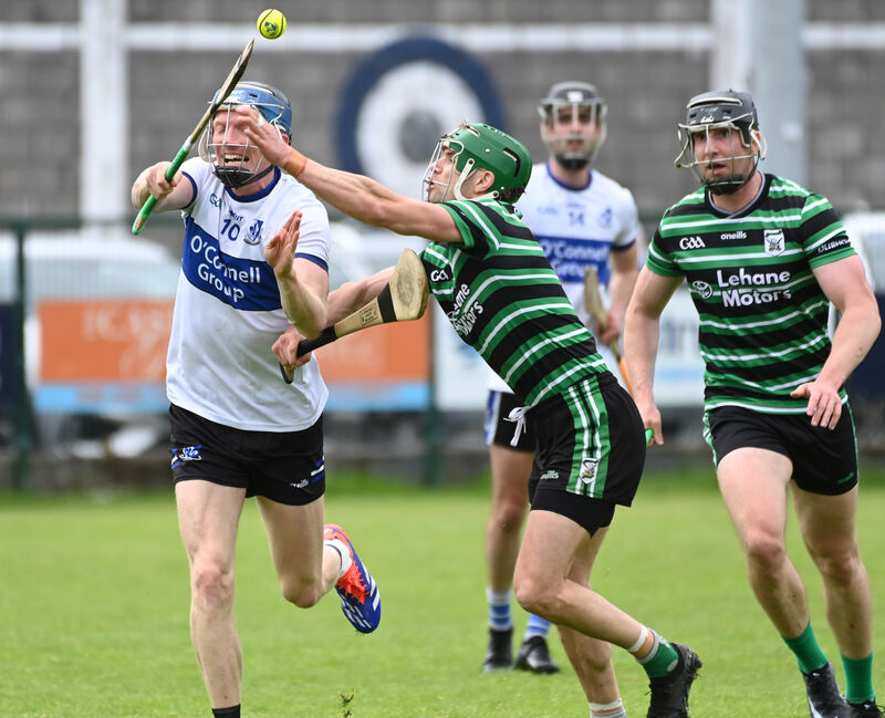 Sarsfields' Cian Darcy is tackled by Douglas' Alan Cadogan. Picture: Eddie O'Hare