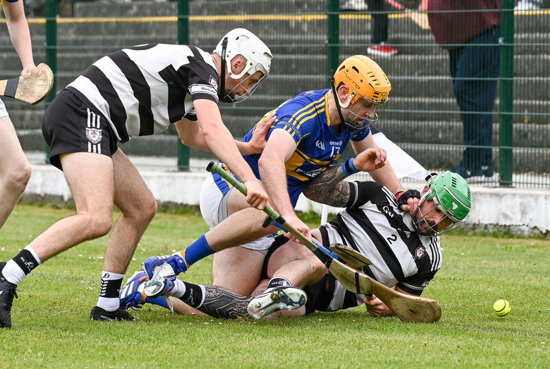 Midleton's Cárthaigh Cronin and Luke Dineen tussle with Carrigtwohill's Liam Sullivan. Picture: David Keane Midleton's Cárthaigh Cronin and Luke Dineen tussle with Carrigtwohill's Liam Sullivan. Picture: David Keane