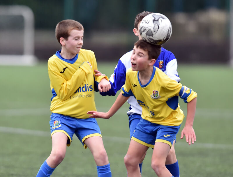 Carrigaline United's Matthew Moore wins the ball from Corinthian Boys Chris Harrington during the Blackwater Motors U12 Premier CSL at Ballea Park Carrigaline United's Matthew Moore wins the ball from Corinthian Boys Chris Harrington during the Blackwater Motors U12 Premier CSL at Ballea Park
