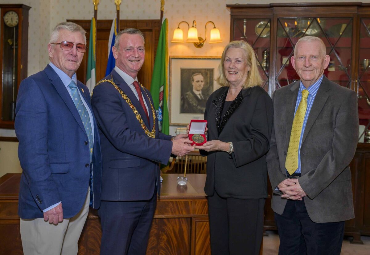Cork Boxing: Lord Mayor of Cork Fergal Dennehy makes a presentation to Fionnuala Mac Curtain on behalf of the Cork County Boxing Board with former president Dan O'Connell and current president Mick O'Brien. Cork Boxing: Lord Mayor of Cork Fergal Dennehy makes a presentation to Fionnuala Mac Curtain on behalf of the Cork County Boxing Board with former president Dan O'Connell and current president Mick O'Brien.