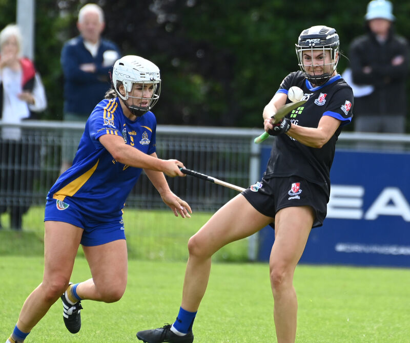 Sarsfields' Lucy Allen shoots from St Finbarr's Aisling Shannon. Picture: Eddie O'Hare Sarsfields' Lucy Allen shoots from St Finbarr's Aisling Shannon. Picture: Eddie O'Hare