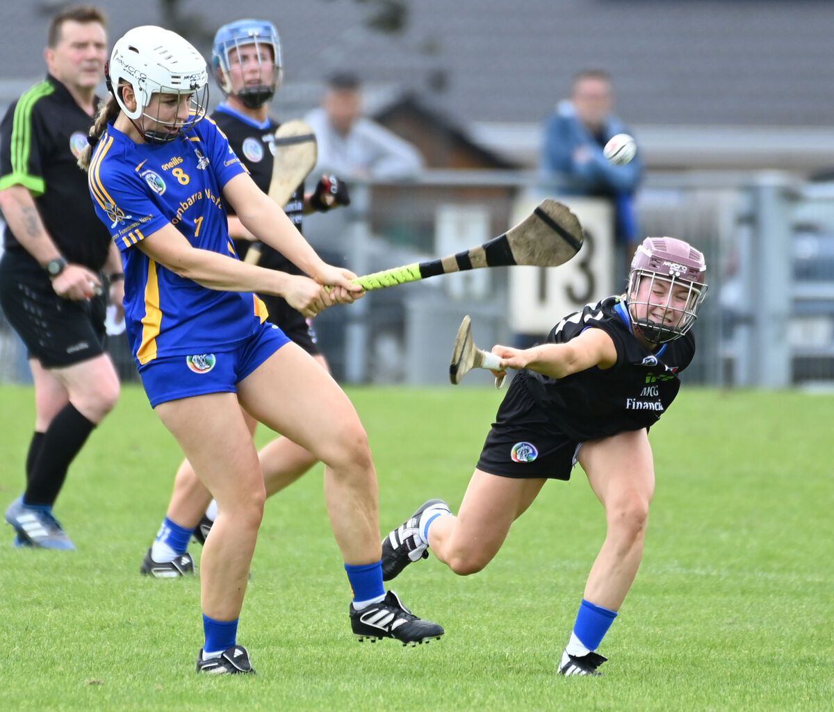 St Finbarr's Aoife Byrne clears from Sarsfields' Clare Mullins. Picture: Eddie O'Hare St Finbarr's Aoife Byrne clears from Sarsfields' Clare Mullins. Picture: Eddie O'Hare