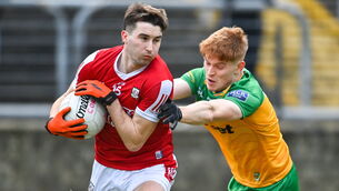<p>Chris Óg Jones of Cork in action against Ciarán Moore of Donegal in Ballybofey. Picture: Ramsey Cardy/Sportsfile</p>