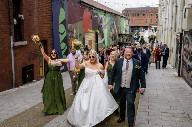 The wedding party en route to the Metropole Hotel. The wedding party en route to the Metropole Hotel.