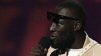 Stormzy fined for using phone while driving £400,000 Ferrari