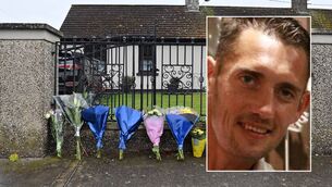 <p>Flowers at the residence on Rockview Terrace, Doneraile, Co Cork, where the body of postman Barry Daly, inset was discovered. Picture: Dan Linehan.</p>
