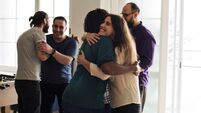 Friends hugging each other