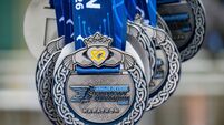 Cork residents honoured with marathon medals for their tribute to the late Ellen Cassidy 