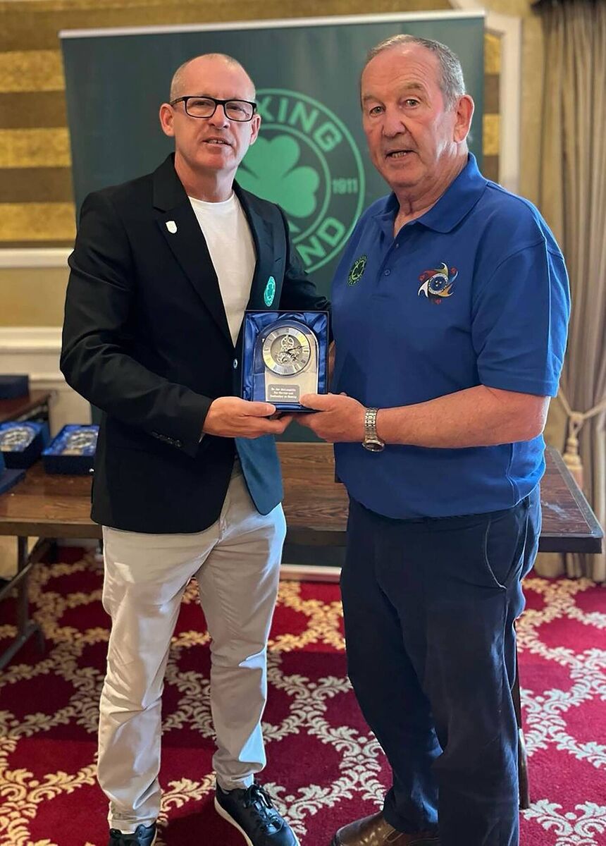 Boxing Ireland president Anto Donnelly receives an award from Munster Council president Ted Barry. Picture: Doug Minihane Boxing Ireland president Anto Donnelly receives an award from Munster Council president Ted Barry. Picture: Doug Minihane