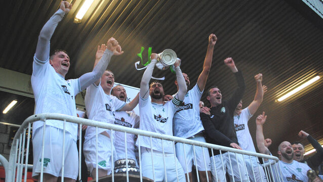 <p>The Coachford A players celebrate after being presented with the AOH Cup following their 4-1 victory over Mallow Town. Picture: Barry Peelo.</p>