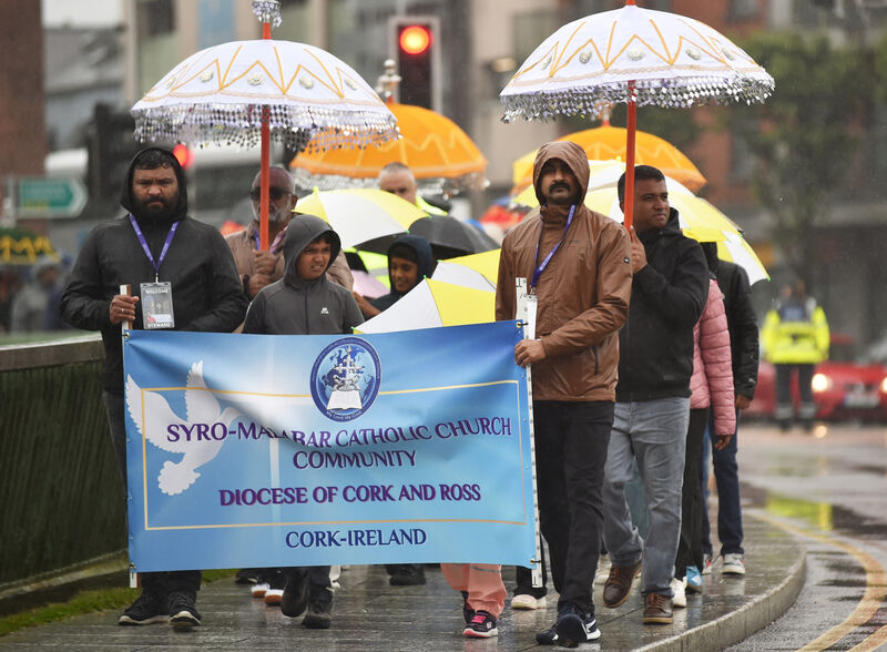 Representatives from various countries who braved the wet weather during the centenary year Eucharistic procession in Cork. Representatives from various countries who braved the wet weather during the centenary year Eucharistic procession in Cork.