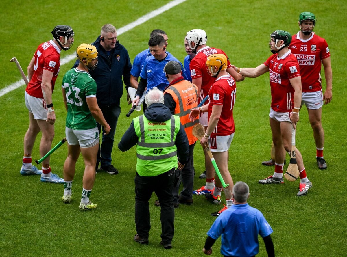 Cork players attempt to speak to referee James Owens after. Picture: Brendan Moran/Sportsfile Cork players attempt to speak to referee James Owens after. Picture: Brendan Moran/Sportsfile