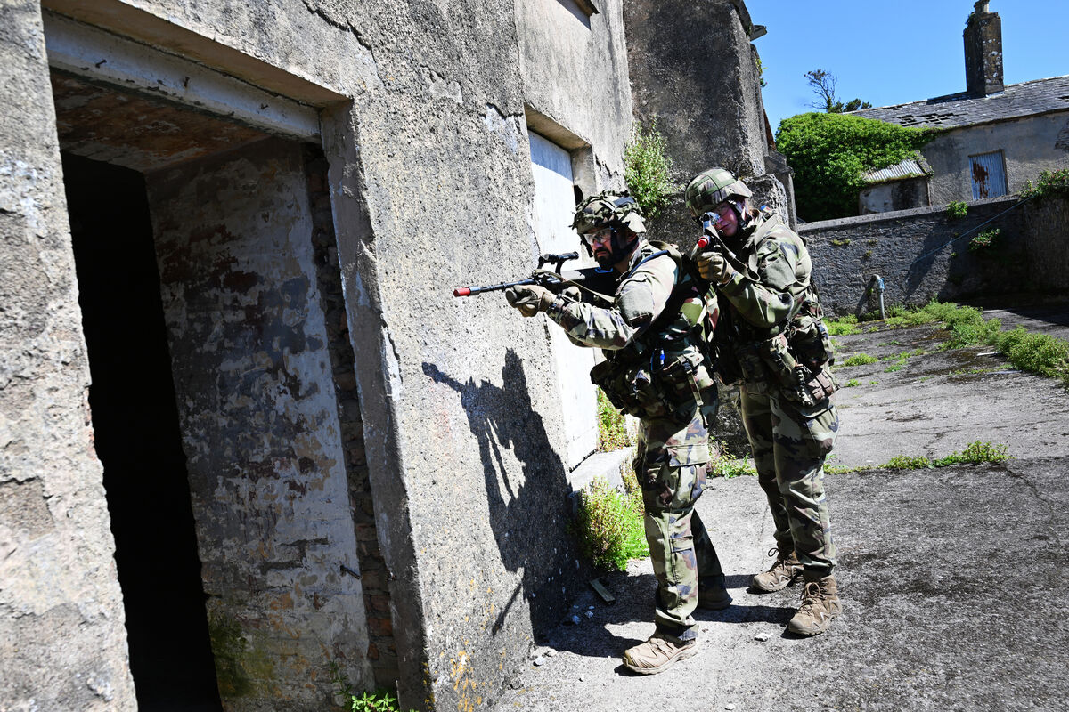 Troopers Francois Olivier and Eimear Walsh training in urban combat. Troopers Francois Olivier and Eimear Walsh training in urban combat.