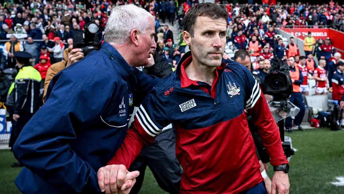 CATCH YA SOON: Limerick's John Kiely and Cork's Ben O'Connor shake hands after the draining Munster SHC final at SuperValu Páirc Uí Chaoimh. Pic: Ray McManus/Sportsfile