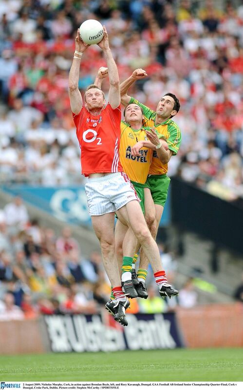 Cork's Nicholas Murphy claims possession despite the attentions of Donegal pair Brendan Boyle and Rory Kavanagh. Picture: Stephen McCarthy/Sportsfile