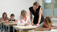 Teacher and students in a classroom