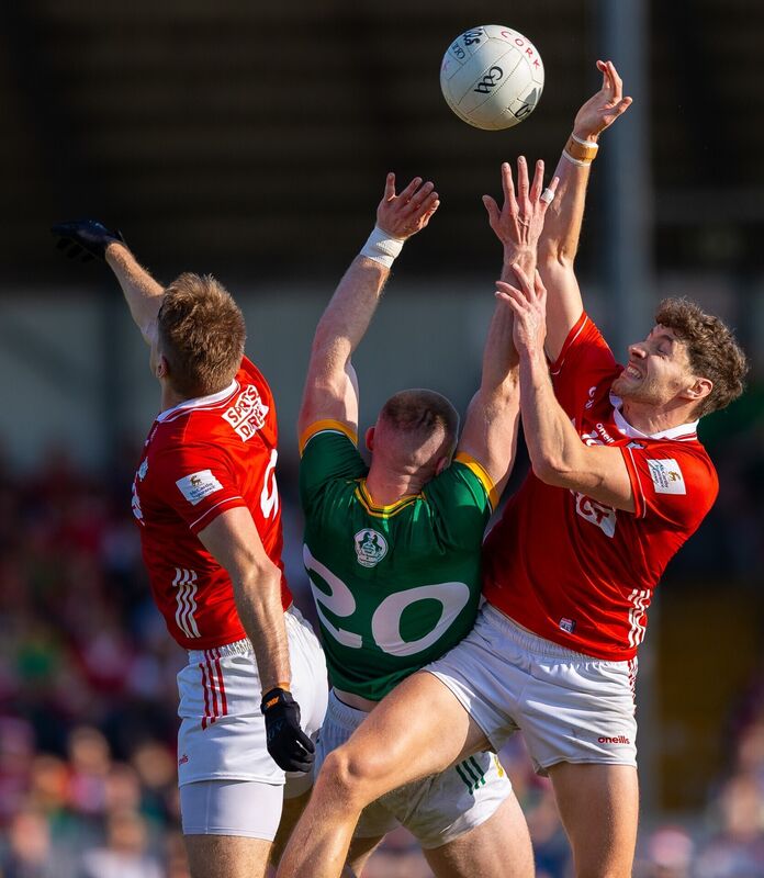 Cork vs Meath: Cork's Ian Maguire and Paul Walsh with Ronan Jones of Meath