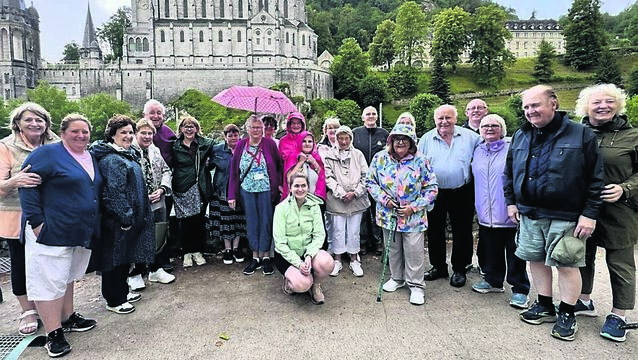 <p class="contextmenu internal_Caption">POIGNANT: A group from Cloyne diocese at the Ceremony of The Stones in Lourdes last week, with John Arnold fifth from right</p>