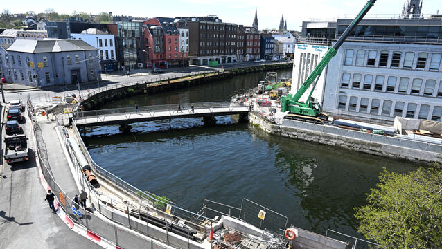 <p>The flood defence works are continuing at Morrison's Island and Union Quay. Picture: Larry Cummins.</p> <p>The flood defence works are continuing at Morrison's Island and Union Quay. Picture: Larry Cummins.</p>