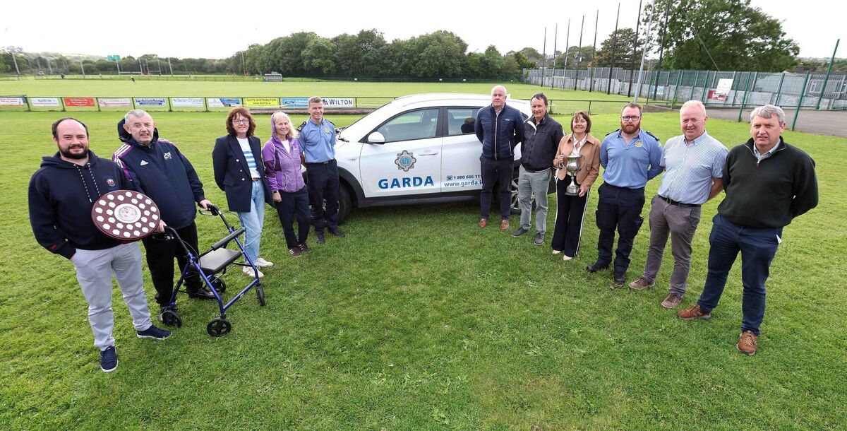 John Kerins, Humphrey Kerins, Breda O'Sullivan, Norma Kerins, Garda David Craig, Sgt Mick O'Connell, CPO, Garda John O'Driscoll, JLO, Ann Kerins, Garda Chris Campbell, Garda Tony Harnett, JLO, and Garda Liam Linehan, JLO with the John Kerins Memorial Shield and Cup at the launch of the finals at St Finbarr's GAA Club. John Kerins, Humphrey Kerins, Breda O'Sullivan, Norma Kerins, Garda David Craig, Sgt Mick O'Connell, CPO, Garda John O'Driscoll, JLO, Ann Kerins, Garda Chris Campbell, Garda Tony Harnett, JLO, and Garda Liam Linehan, JLO with the John Kerins Memorial Shield and Cup at the launch of the finals at St Finbarr's GAA Club.