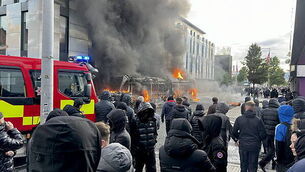 Man and woman in court over disorder linked to Belfast attack Man and woman in court over disorder linked to Belfast attack