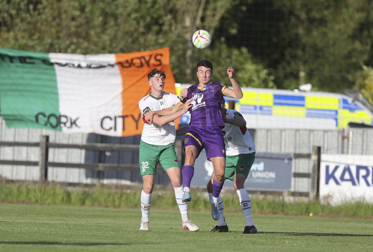 Wexford’s Jake Doyle and Cork City’s Donal O'Connor fight for the ball. Photograph: Patrick Browne Wexford’s Jake Doyle and Cork City’s Donal O'Connor fight for the ball. Photograph: Patrick Browne