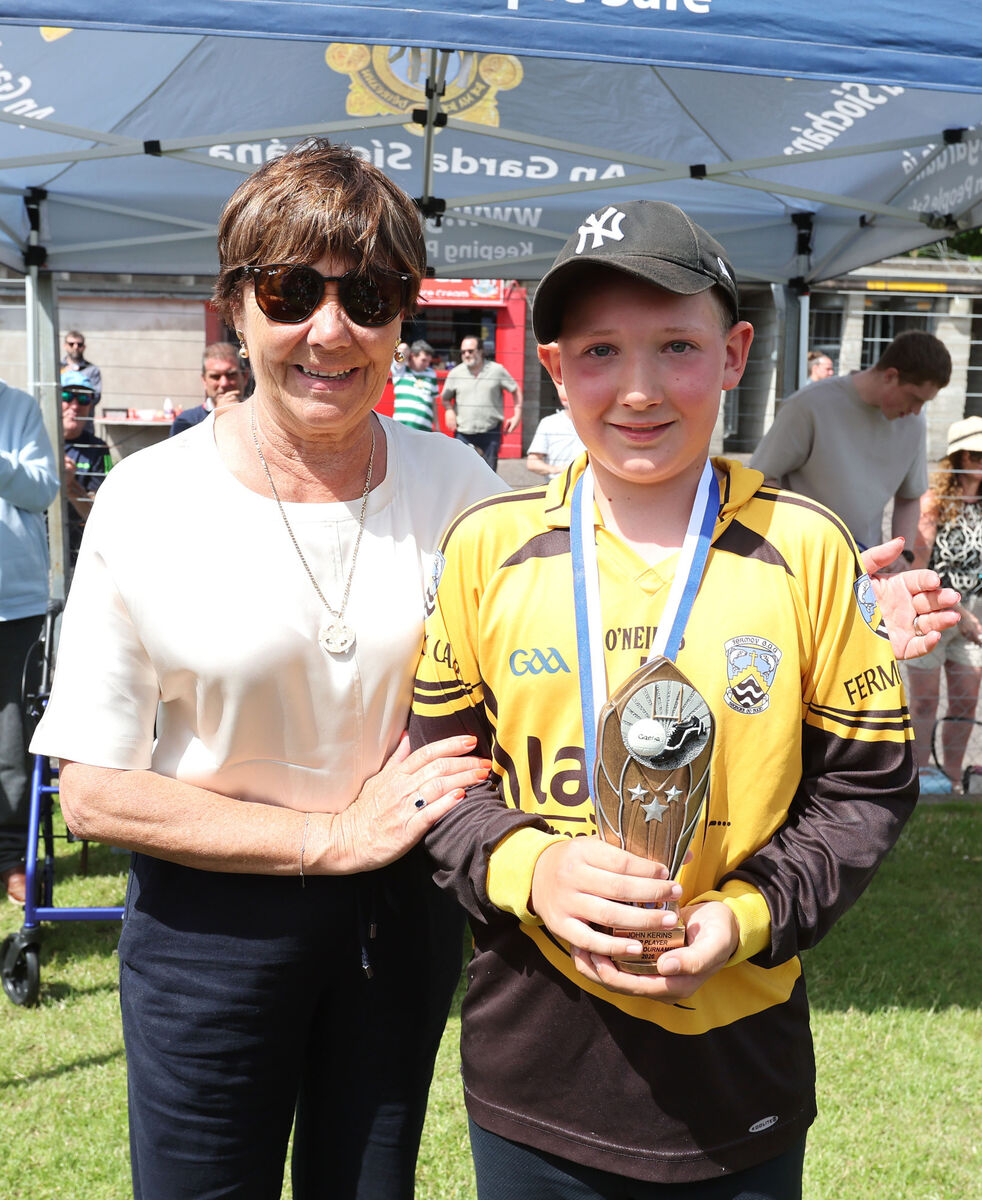 John Kerins Memorial Cup Final. Nemo Rangers V's Fermoy. Ann Kerins, presents the Cup Competition MVP trophy to Alex Wieczorek, Fermoy. John Kerins Memorial Cup Final. Nemo Rangers V's Fermoy. Ann Kerins, presents the Cup Competition MVP trophy to Alex Wieczorek, Fermoy.