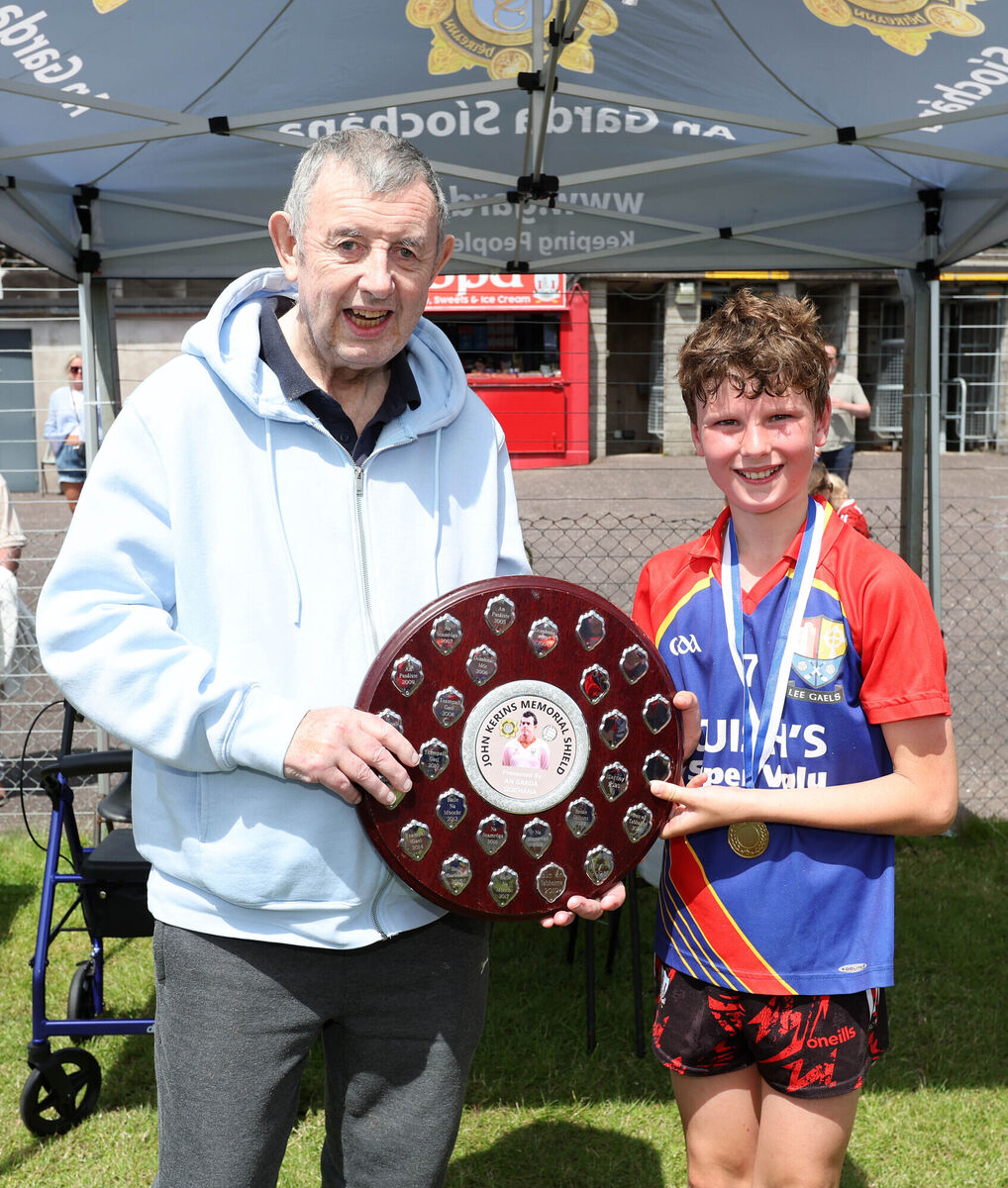 John Kerins Memorial Shield Final: Lee Gaels V's Brian Dillon's: Humphry Kerins, presents the Shield to the winning Captain, Joseph O'Sullivan, Lee Gaels. John Kerins Memorial Shield Final: Lee Gaels V's Brian Dillon's: Humphry Kerins, presents the Shield to the winning Captain, Joseph O'Sullivan, Lee Gaels.