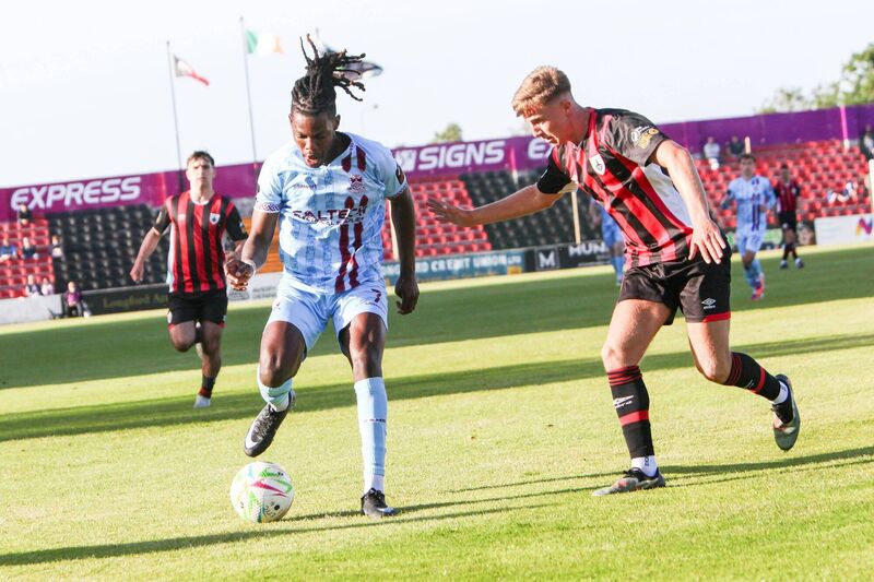 Wilson Waweru Cobh Ramblers and Jake Hough Longford Town in Bishopsgate, Longford. Photo Paul Molloy. 