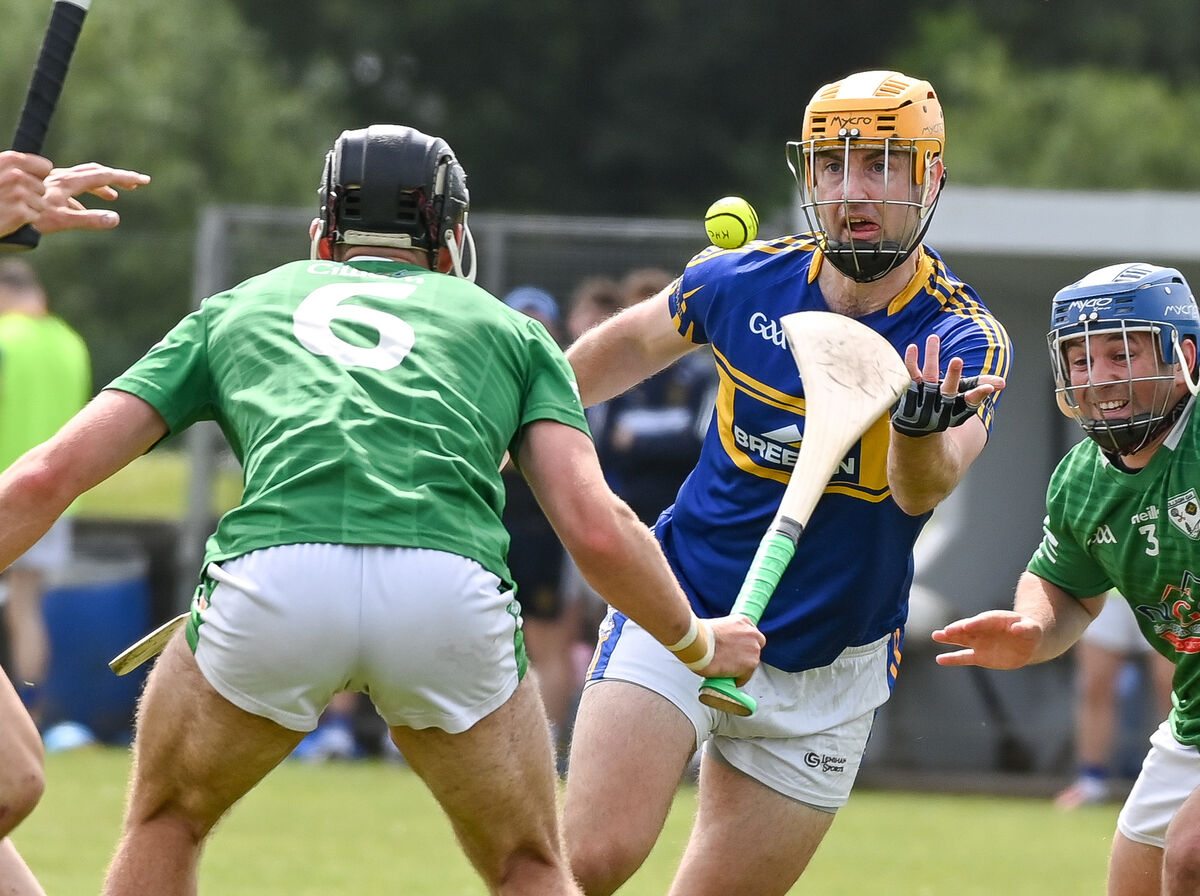 Carrigtwohill's Liam O'Sullivan gets his pass away past Killeagh's Ben Walsh during their SHL clash at Carrigtwohill. Carrigtwohill's Liam O'Sullivan gets his pass away past Killeagh's Ben Walsh during their SHL clash at Carrigtwohill.