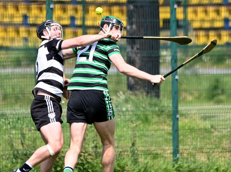 Midleton's Seán O'Sullivan and Douglas' Niall Hartnett tussle for the sliotar during the RedFM SHL division one game at Douglas. Picture; Eddie O'Hare Midleton's Seán O'Sullivan and Douglas' Niall Hartnett tussle for the sliotar during the RedFM SHL division one game at Douglas. Picture; Eddie O'Hare