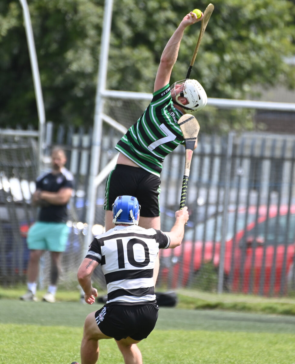 Douglas' Cillian O'Donovan soars through the air to win the sliotar from Midleton's Seán O'Meara during the RedFM SHL division one game at Douglas. Picture; Eddie O'Hare Douglas' Cillian O'Donovan soars through the air to win the sliotar from Midleton's Seán O'Meara during the RedFM SHL division one game at Douglas. Picture; Eddie O'Hare
