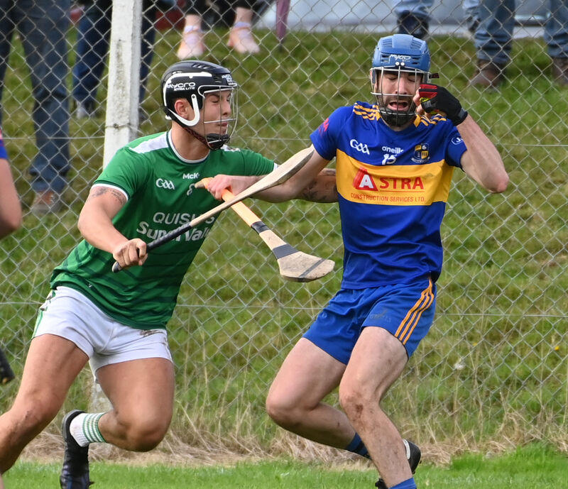 6th October 2024: Carrigaline's Brian Kelleher is tackled by Ballincollig's James Dwyer during the Co -Op Superstores Premier IHC semi final at Ballygarvan. Picture: Eddie O'Hare 6th October 2024: Carrigaline's Brian Kelleher is tackled by Ballincollig's James Dwyer during the Co -Op Superstores Premier IHC semi final at Ballygarvan. Picture: Eddie O'Hare