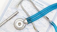 Patient information sheet with a stethoscope