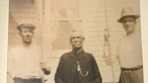 <p>Michael Farrell (centre, dressed in black) 1843-1920. He was born in Boherbue and baptised in Rathcormac. </p> <p>Michael Farrell (centre, dressed in black) 1843-1920. He was born in Boherbue and baptised in Rathcormac. </p>
