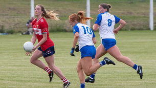 <p>Cork's Kate Redmond avoids the tackle of Eve Power and Maeve Daly of Waterford during their TG4 LGFA All-Ireland Senior Championship match in the Fraher Field, Dungarvan. Picture: Howard Crowdy</p> <p>Cork's Kate Redmond avoids the tackle of Eve Power and Maeve Daly of Waterford during their TG4 LGFA All-Ireland Senior Championship match in the Fraher Field, Dungarvan. Picture: Howard Crowdy</p>