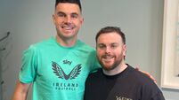 A cut above: Cork barber enjoys the small talk with Ireland football stars