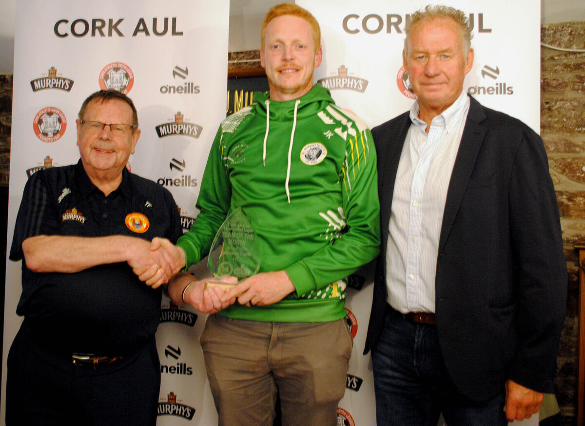 Tom Fitzgerald (Cork AUL) presents the team of the month award for March to Belmount Celtic's James Kelleher. Also in picture is Jim Cashman (Heineken Ireland). Tom Fitzgerald (Cork AUL) presents the team of the month award for March to Belmount Celtic's James Kelleher. Also in picture is Jim Cashman (Heineken Ireland).