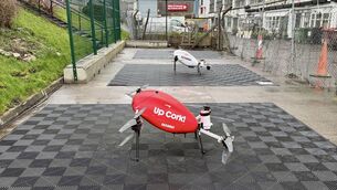 <p> Manna delivery drone in the red colour of Cork with the message Up Cork! printed on the side. Picture: Larry Cummins</p> <p> Manna delivery drone in the red colour of Cork with the message Up Cork! printed on the side. Picture: Larry Cummins</p>