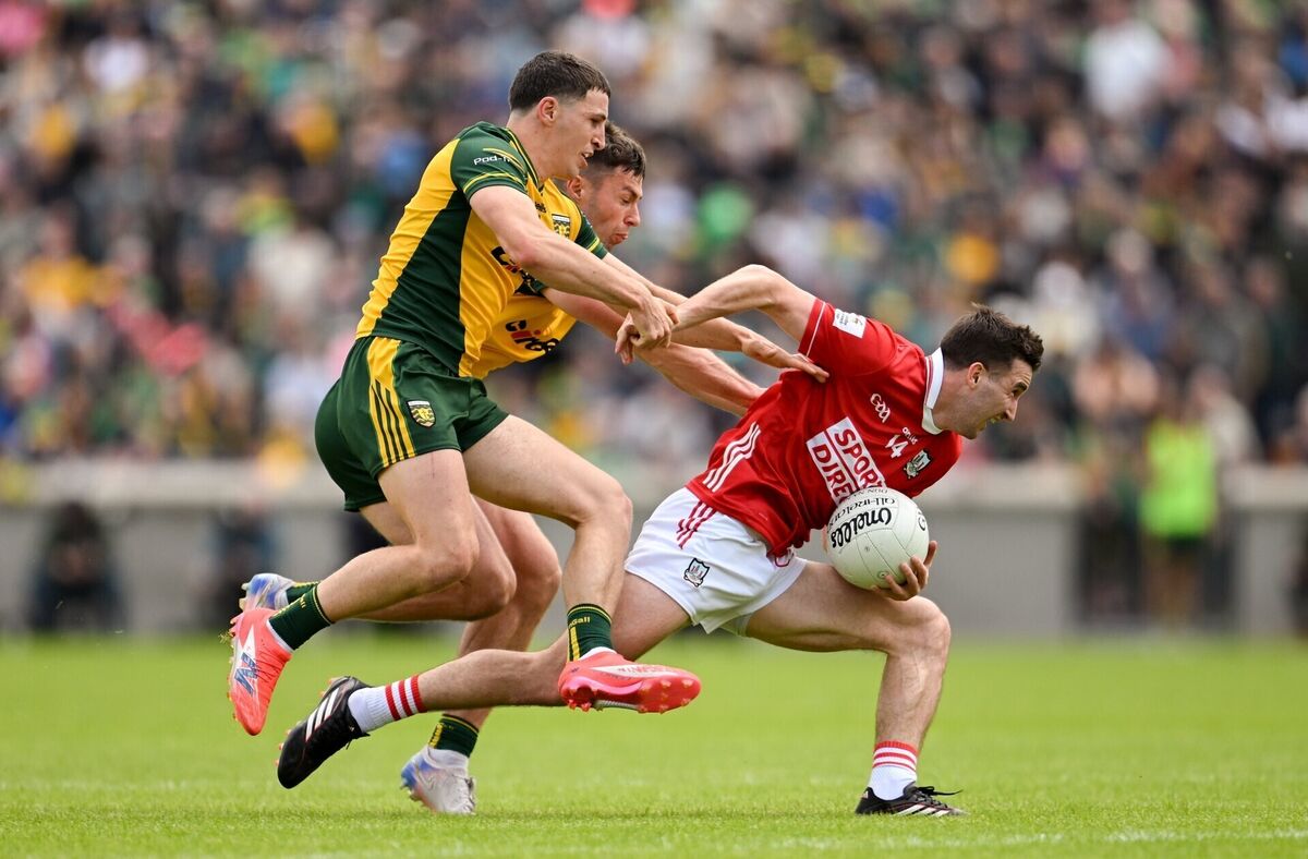 Chris Óg Jones of Cork in action against Finnbarr Roarty and Conor O'Donnell of Donegal. Picture: Ramsey Cardy/Sportsfile Chris Óg Jones of Cork in action against Finnbarr Roarty and Conor O'Donnell of Donegal. Picture: Ramsey Cardy/Sportsfile