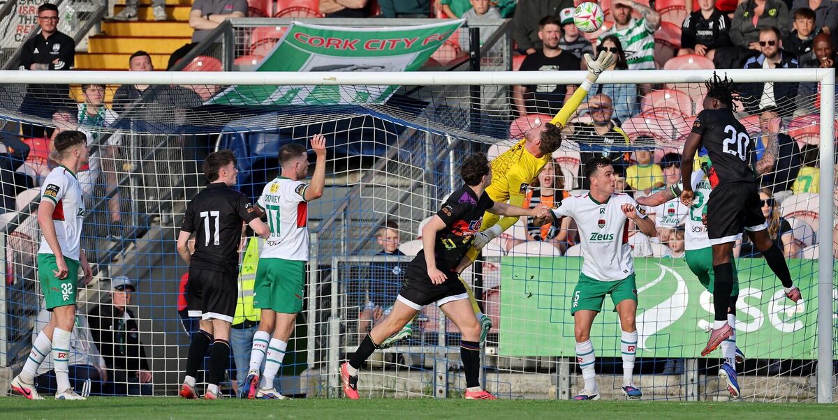 Conor Brann, Cork City goalkeeper at full stretch to prevent the ball reaching Darren Nwankwo. Picture: Jim Coughlan. Conor Brann, Cork City goalkeeper at full stretch to prevent the ball reaching Darren Nwankwo. Picture: Jim Coughlan.
