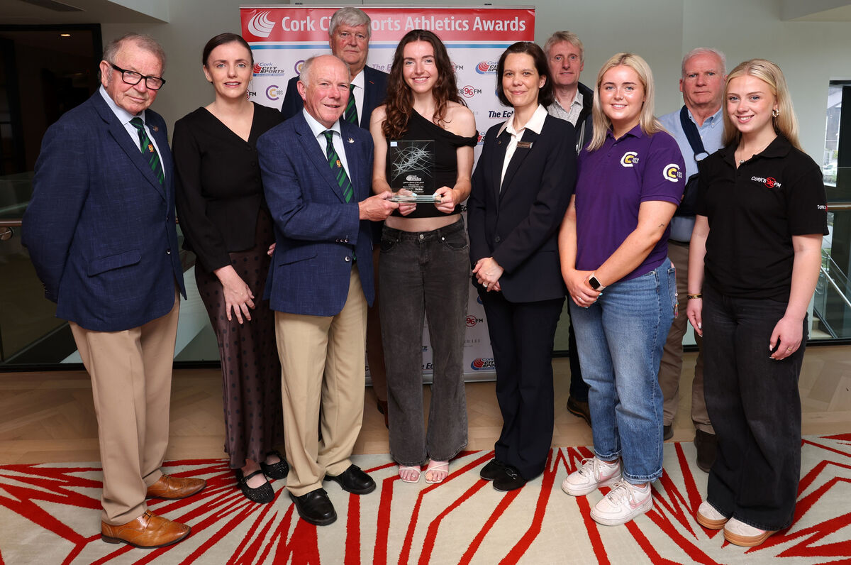 Pictured is Ray Shanahan, Cork City Sports Chairperson presenting the February Award to Maeve O'Neill, Doheny AC, also included are, Frank Walley, Cork City Sports President, Mary Riordan, The Echo, Mark Walk, Cork City Sports, Gabriella Favory, The River Lee Hotel, George Duggan, Cork Crystal, Grace Lynch, C 103, Donal Murnane, Cork City Sports and Caitlin O'Callaghan, Cork's 96 FM, at the presentation of the Cork City Sports Athlete of the Month Awards for February, March, April and May 2026, at The River Lee Hotel, Cork. 