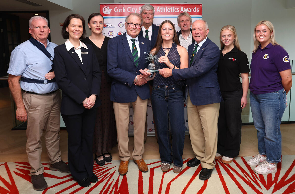 Pictured is Frank Walley, Cork City Sports President presenting the April Award to Gabriella Bowen, MTU, also included are, Donal Murnane, Cork City Sports, Gabriella Favory, The River Lee Hotel, Mary Riordan, The Echo, Mark Walk, Cork City Sports, George Duggan, Cork Crystal, Ray Shanahan, Cork City Sports Chairperson, Caitlin O'Callaghan, Cork's 96FM and Grace Lynch, C103, at the presentation of the Cork City Sports Athlete of the Month Awards for February, March, April and May 2026, at The River Lee Hotel, Cork. 