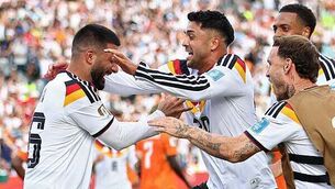 Late strike gets Germany past Ivory Coast, into knockout round