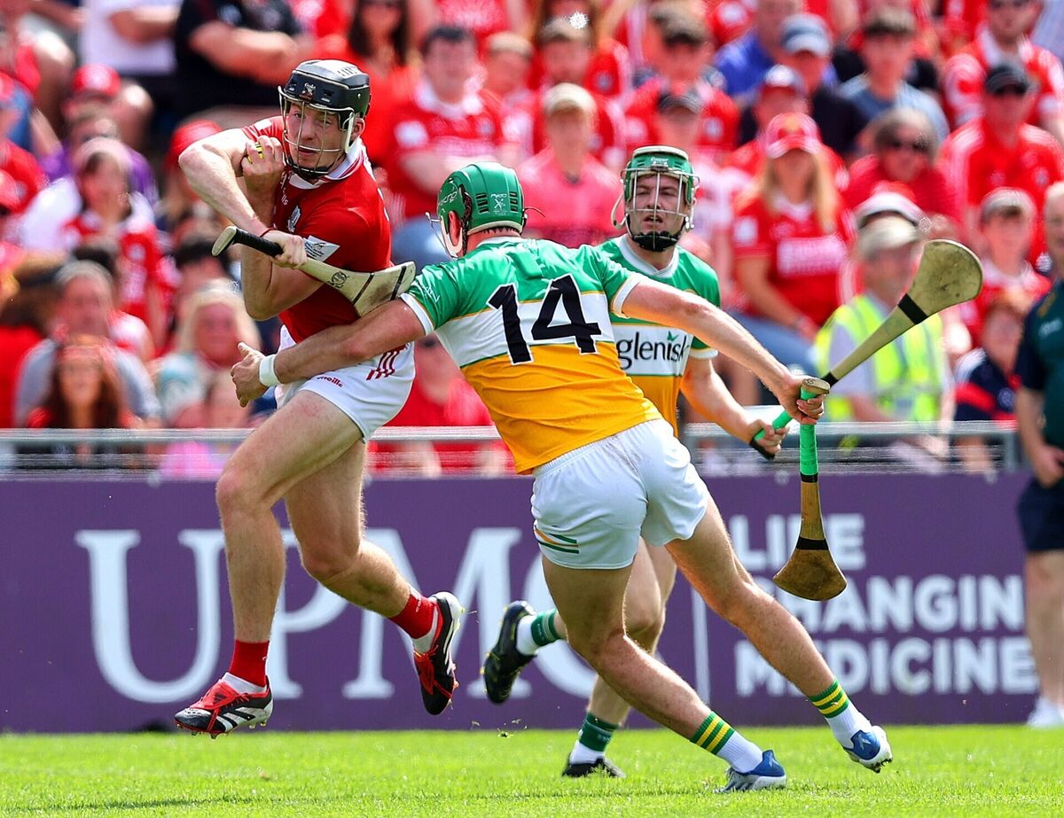 Cork's Eoin Downey tries to get away from Brian Duignan of Offaly. Picture: Inpho/Tom O'Hanlon Cork's Eoin Downey tries to get away from Brian Duignan of Offaly. Picture: Inpho/Tom O'Hanlon