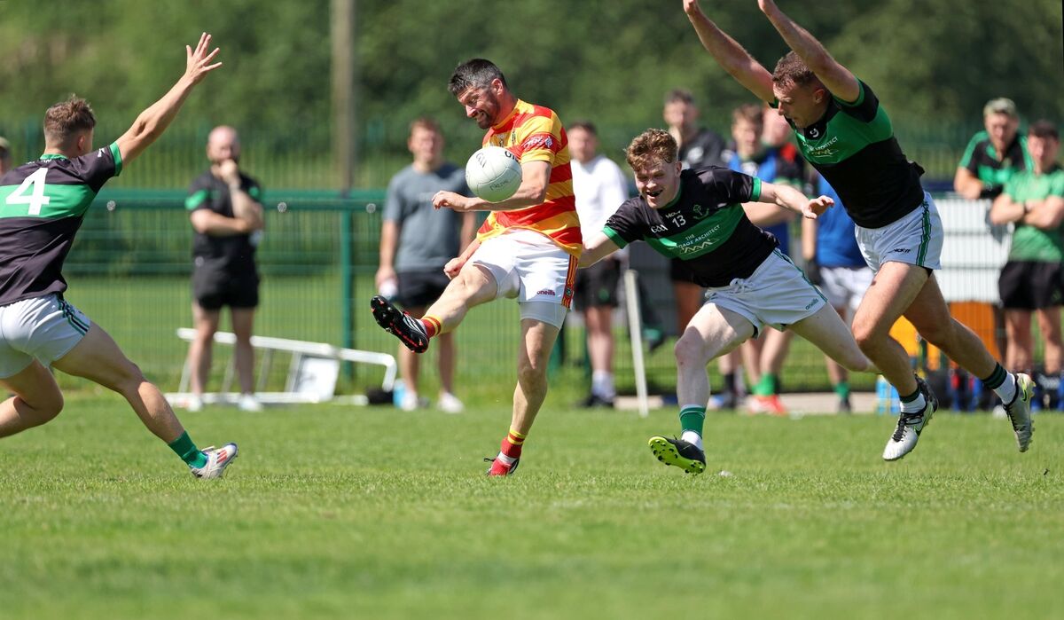 Neville O'Shea, Ross Corkery and Briain Murphy, Nemo Rangers, Tadhg Twomey, Newcestown. 2026 McCarthy Insurance Group Division 1 Football League, Nemo Rangers V's Newcestown, at Trabeg, Cork. Neville O'Shea, Ross Corkery and Briain Murphy, Nemo Rangers, Tadhg Twomey, Newcestown. 2026 McCarthy Insurance Group Division 1 Football League, Nemo Rangers V's Newcestown, at Trabeg, Cork.